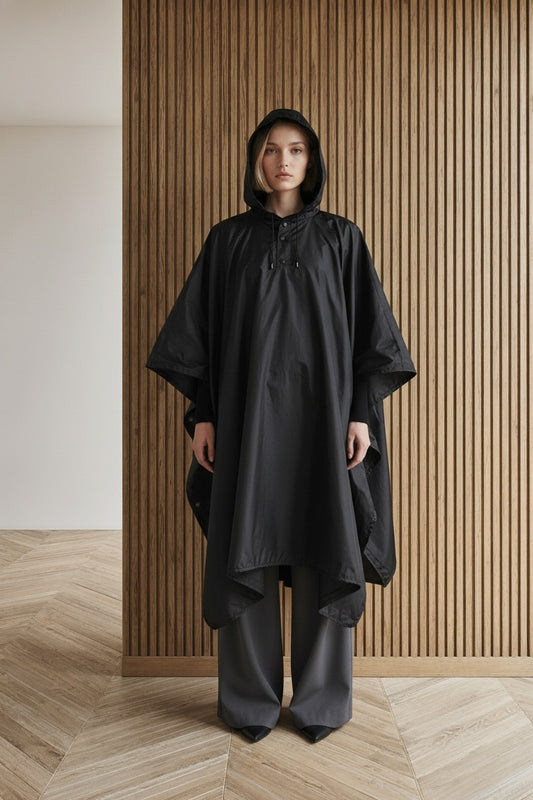 Full body view of the model wearing Ultra-Light Waterproof Poncho | Compact Rain Protection